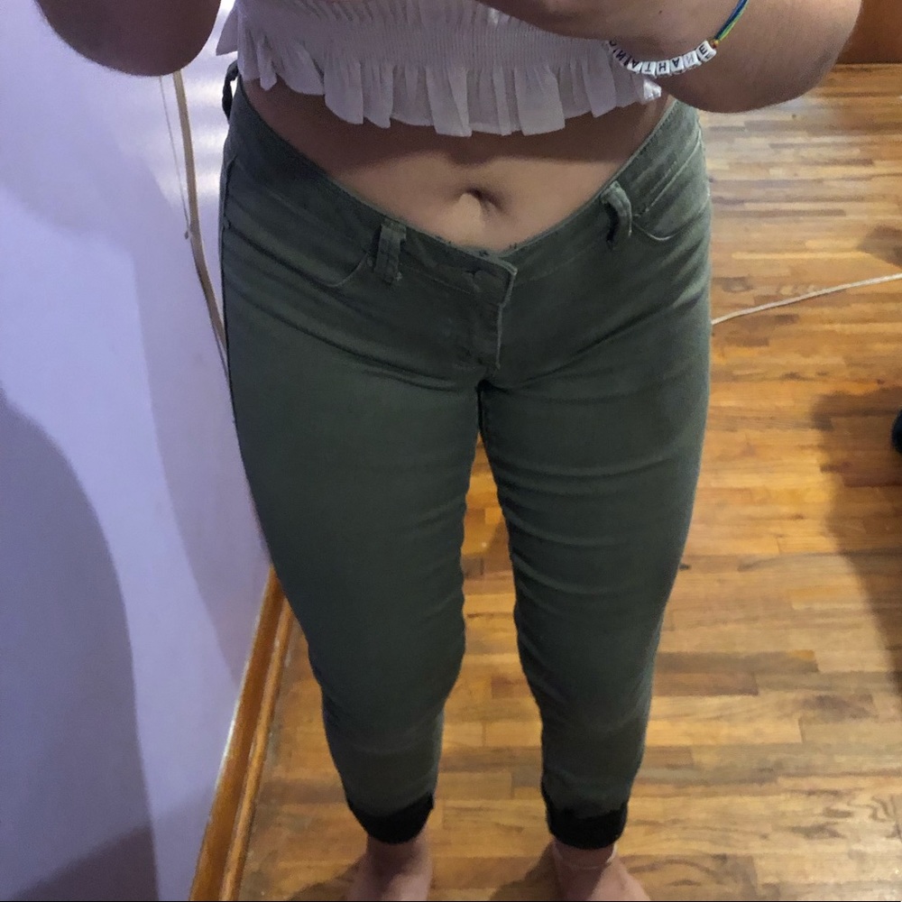 Light/ medium washed green skinny jeans